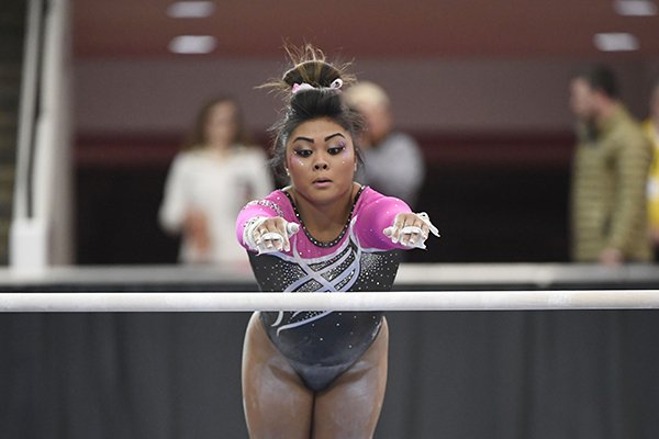 Arkansas gymnast Jessica Yamzon competes against Alabama during an NCAA Gymnastics meet, Feb. 8, 2019 in Fayetteville. (AP Photo/Michael Woods)

