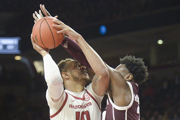 Arkansas forward Daniel Gafford goes up for a shot during a game against Texas A&M on Saturday, Feb. 23, 2019, in Fayetteville. 