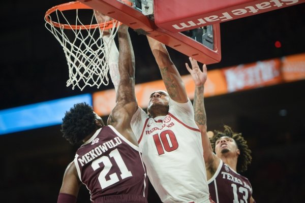 Arkansas Razorbacks forward Daniel Gafford (10) dunks during a basketball game, Saturday, February 23, 2019 at Bud Walton Arena in Fayetteville.