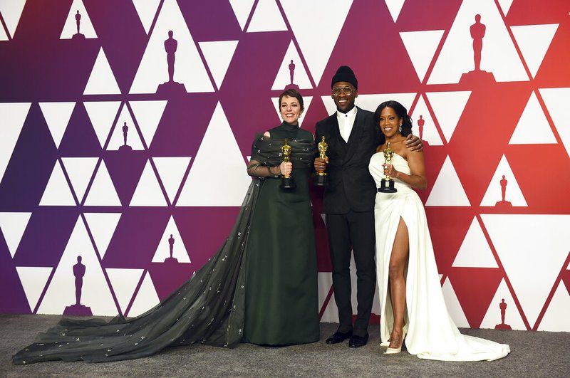 Olivia Colman, from left, poses with the award for best performance by an actress in a leading role for "The Favourite", Mahershala Ali poses with the award for best performance by an actor in a supporting role for "Green Book", and Regina King poses with the award for best performance by an actress in a supporting role for "If Beale Street Could Talk" in the press room at the Oscars on Sunday, Feb. 24, 2019, at the Dolby Theatre in Los Angeles. (Photo by Jordan Strauss/Invision/AP)