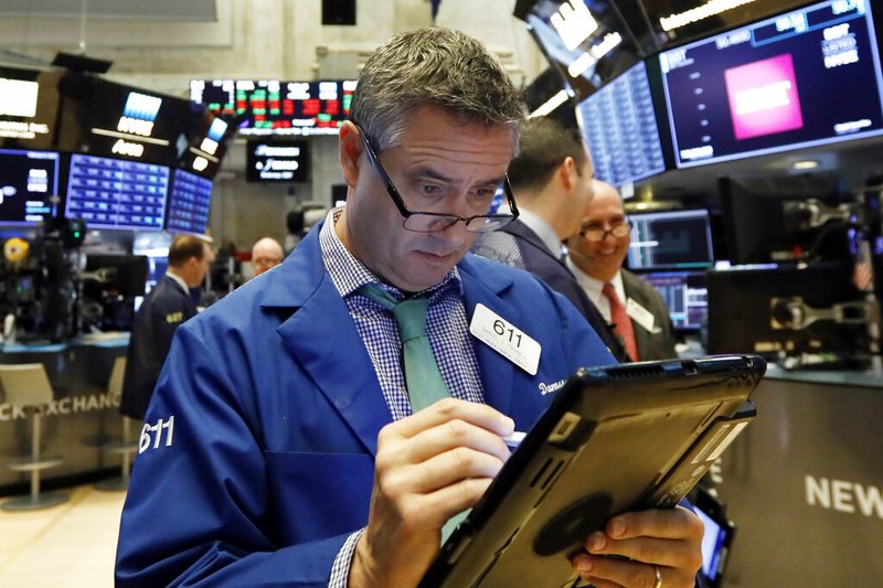 In this Feb. 8, 2019, file photo trader Daniel Trimble works on the floor of the New York Stock Exchange. The U.S. stock market opens at 9:30 a.m. EST on Monday, Feb. 25. (AP Photo/Richard Drew, File)