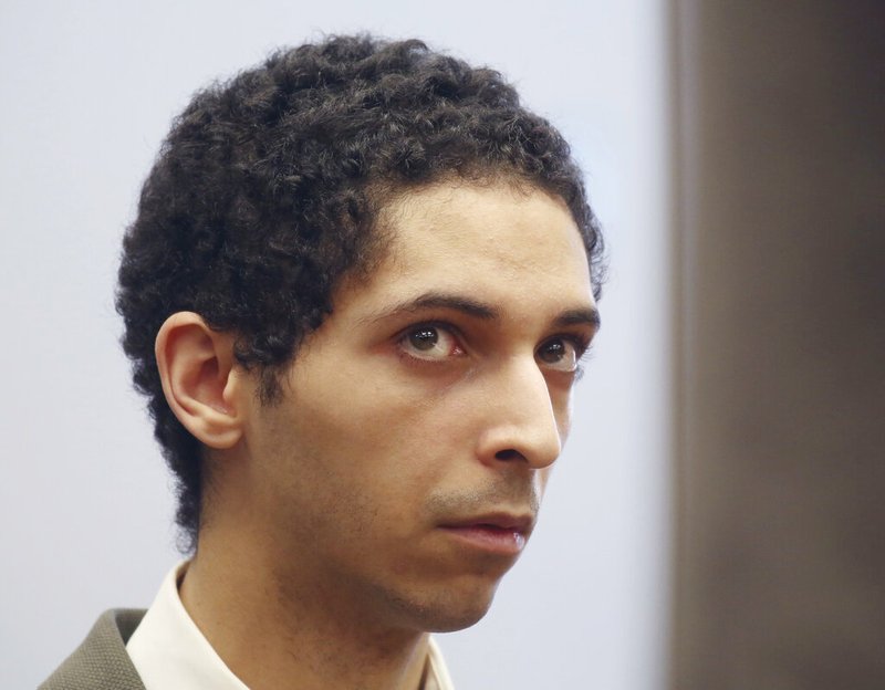 In this May 22, 2018, file photo, Tyler Barriss, of California, appears for a preliminary hearing in Wichita, Kan. The California man is asking the judge for a 20-year prison sentence for making a hoax call that led police to fatally shoot a Kansas man following a dispute between online gamers. His attorney argued in a motion Barriss never intended for anyone to get hurt and his conduct was an outgrowth of the culture within the gaming community. (Bo Rader/The Wichita Eagle via AP, File)