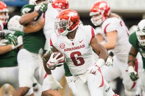T.J. Hammonds, Arkansas running back, carries in the 2nd quarter vs Colorado State Saturday, Sept. 8, 2018, at Canvas Stadium in Fort Collins, Colo.