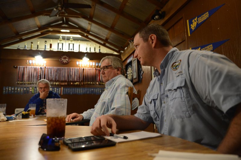  Andy Yung, AGFC head biologist for the region, speaks at a Feb. 25 Rural Development Authority meeting in Magnolia. Also pictured are RDA Chairman Dan Gregory (left) and RDA Commissioner Darrell Chatelain.