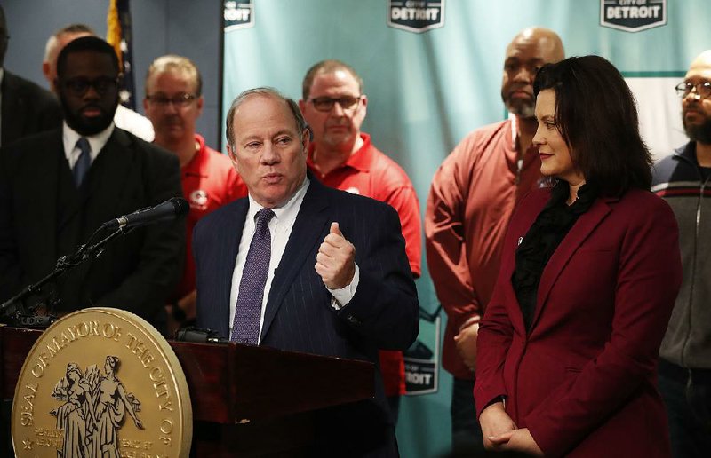 At a news conference Tuesday, Detroit Mayor Mike Duggan said Fiat Chrysler’s plans to update its plants and create jobs were a “once in a generational chance to change the economic” fortunes of Detroit. 