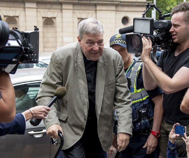 Cardinal George Pell arrives Tuesday at the County Court in Melbourne, Australia. 