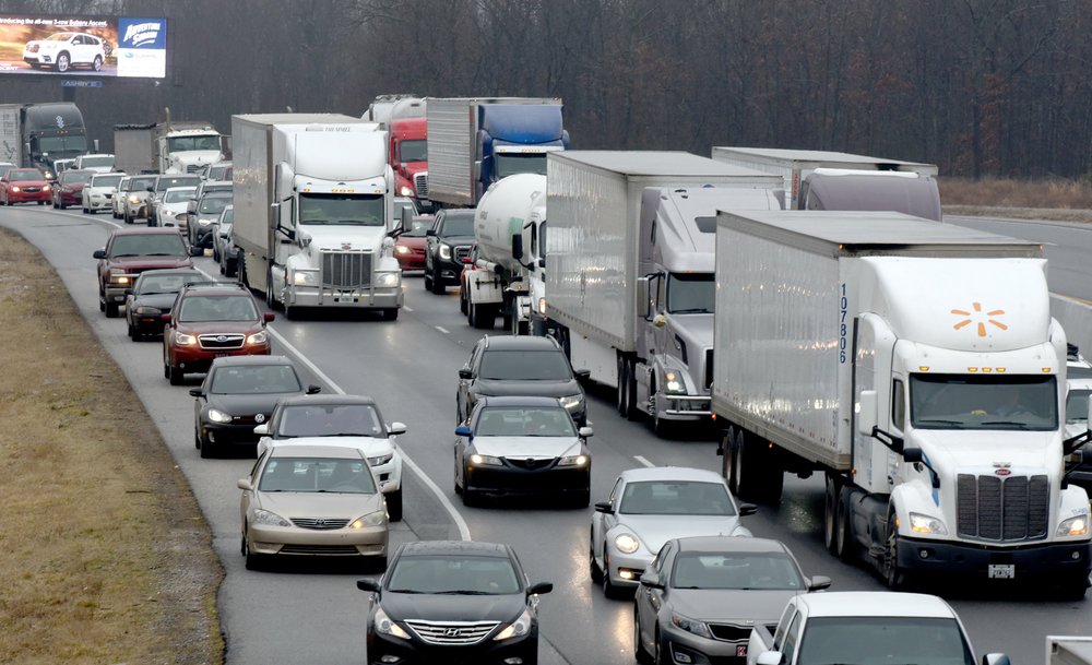 PHOTOS Pickup skids off icy overpass in Northwest Arkansas, ends up