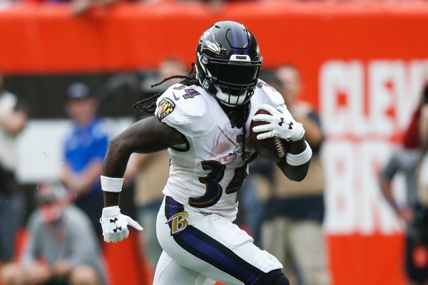 Baltimore Ravens running back Alex Collins (34) plays against the Cleveland Browns during overtime in an NFL football game, Sunday, Oct. 7, 2018, in Cleveland. (AP Photo/Ron Schwane)
