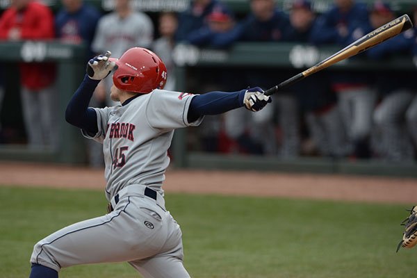 Stony Brook's John Tuccillo swings and misses during a game against Arkansas on Friday, March 1, 2019, in Fayetteville.