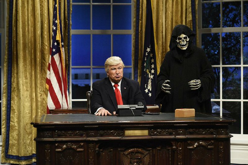 Alec Baldwin as President Trump and Mikey Day as Steve Bannon on Saturday Night Live in 2017. 
