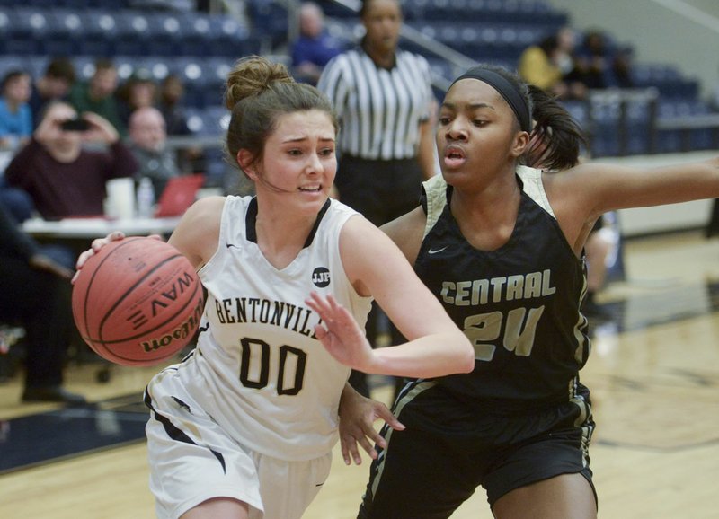 NWA Democrat-Gazette/CHARLIE KAIJO Bentonville High School guard Avery Hughes (0) dribbles during the Class 6A state basketball quarterfinals, Friday, March 1, 2019 at Bentonvile West High School in Centerton.