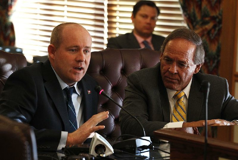 Rep. Jeff Wardlaw (left), R-Hermitage, and Sen. Gary Stubblefield (right), R-Branch, answer questions about SB8, a bill to amend an Arkansas law concerning modification and review of permits issued by the Arkansas Department of Environmental Quality, during the Senate Public Heath, Welfare and Labor Committee meeting on Wednesday, March 14, 2018, at the State Capitol in Little Rock.