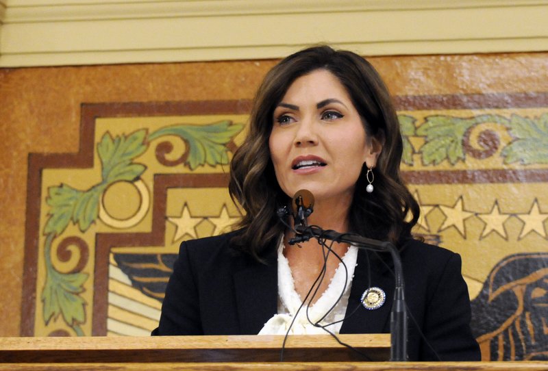 FILE - In this Jan. 8, 2019 file photo, South Dakota Gov. Kristi Noem gives her first State of the State address in Pierre, S.D. Noem says she's proposing legislation ahead of the Keystone XL oil pipeline's construction that would create a legal avenue to pursue out-of-state money that funds protests aimed at slowing construction. The Republican governor said Monday, March 4, 2019 that she wants to make sure Keystone XL and future pipelines are built safely and efficiently while shielding the state and counties from major law enforcement costs if there are riots. (AP Photo/James Nord, File)