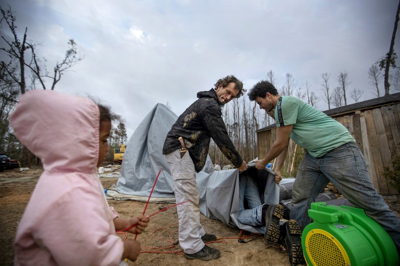Homeless fill tents in Florida backyard | Northwest Arkansas Democrat ...