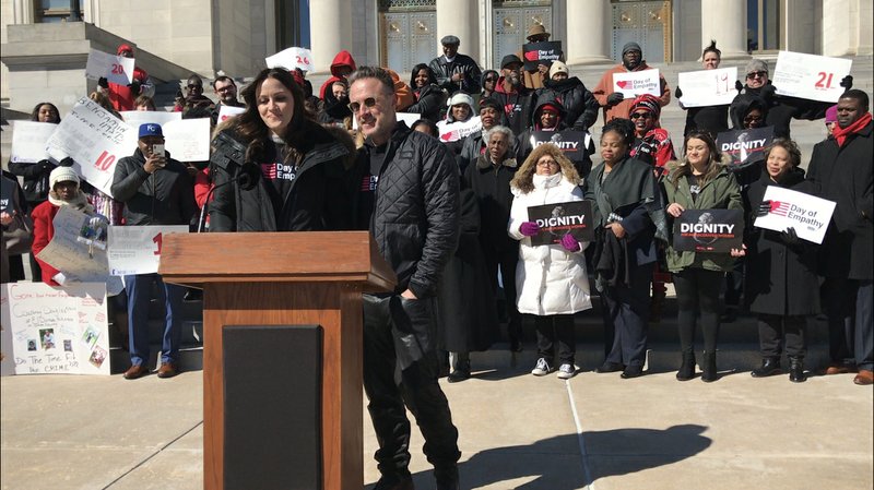 Christina and David Arquette speak on the steps of the state Capitol at an event urging empathy and criminal justice reform on Tuesday. 
