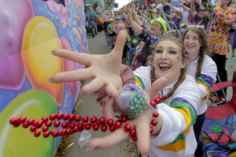 The Krewe of Thoth rolls along the Uptown route in New Orleans, La. Sunday. Founded in 1947, the Krewe of Thoth is named for the Egyptian Patron of Wisdom and Inventor of Science, Art and Letters.(David Grunfeld, NOLA.com | The Times-Picayune)/The Times-Picayune via AP)

