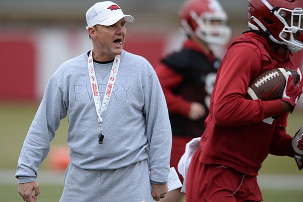 Arkansas coach Chad Morris directs his players Friday, March 1, 2019, during practice at the university practice facility in Fayetteville.