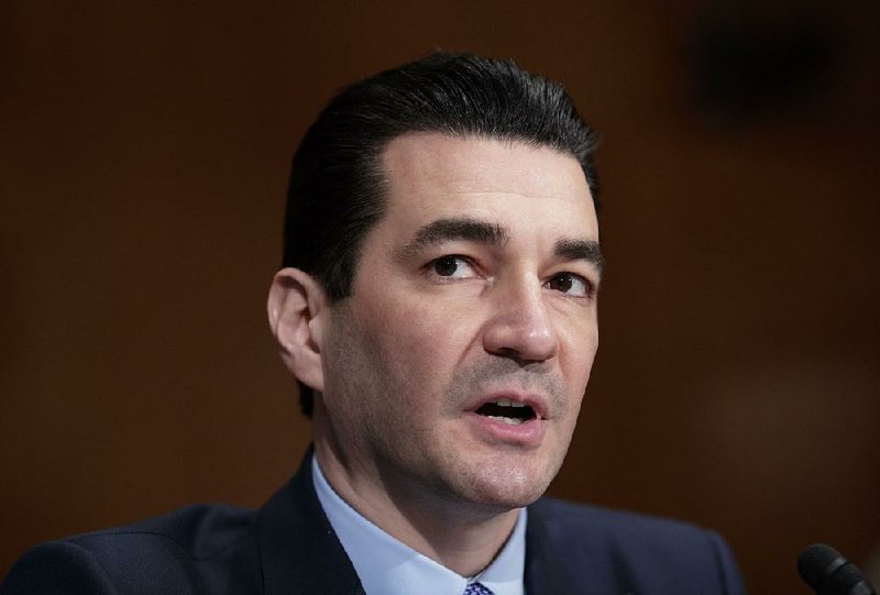 In this Wednesday, April 5, 2017, file photo, Dr. Scott Gottlieb speaks during his confirmation hearing before a Senate committee, in Washington, as President Donald Trump's nominee to head the Food and Drug Administration.  Gottlieb is stepping down after nearly two years leading the agency’s response to a host of public health challenges, including the opioid epidemic, rising drug prices and underage vaping.  