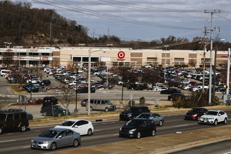Vehicles pass a Target store in Brentwood, Tennessee, on Dec. 5, 2018. Bloomberg photo by Houston Cofield