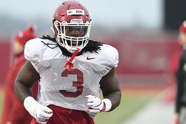 WholeHogSports - Hogs' Agim accepts DT as lasting position