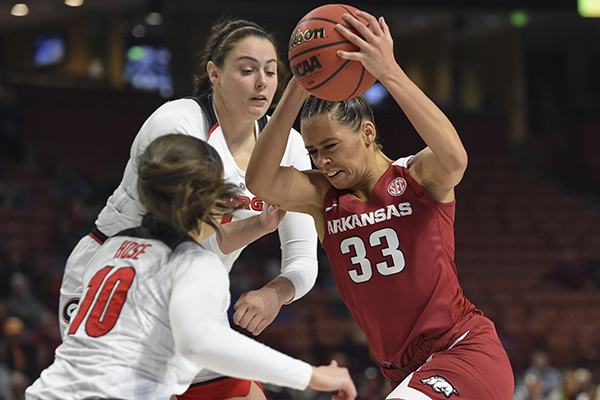 WholeHogSports - Dungee scores 31, leads Arkansas to tournament win