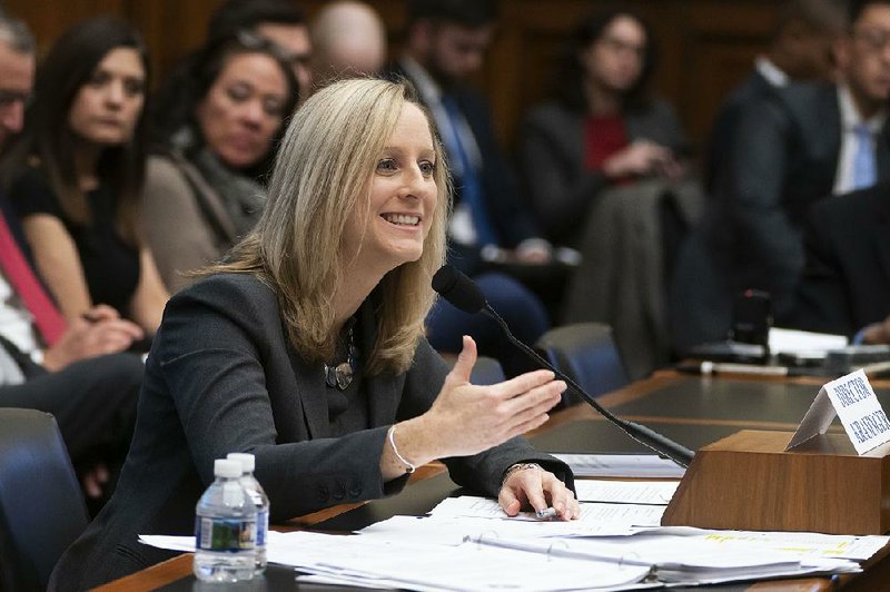 Consumer Financial Protection Bureau Director Kathy Kraninger attends a House Financial Services Committee review Thursday in which she defended the bureau against claims that it has been weakened by the Trump administration.