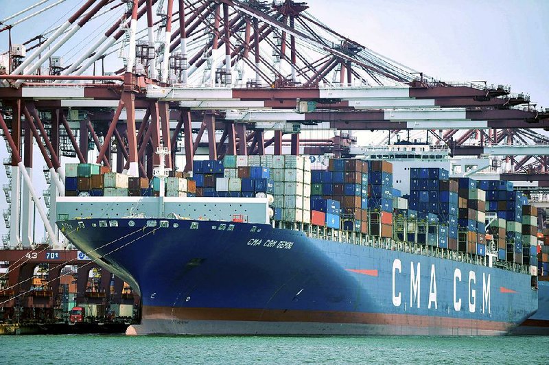 A container ship sits at a port in Qingdao, China. China’s exports fell 20.7 percent in February, the biggest drop since February 2016. 