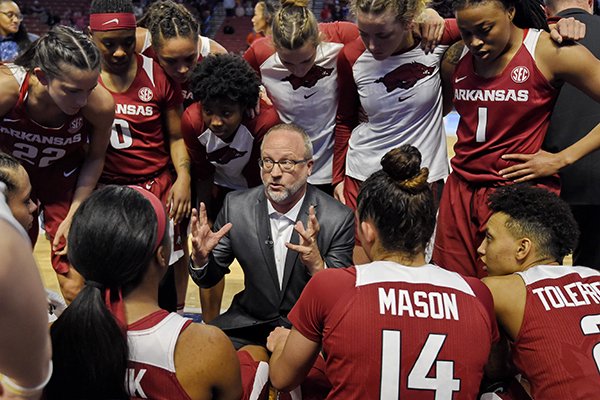 Arkansas head coach Mike Neighbors gives instructions during the second half of an NCAA college basketball game against Texas A&M in the Southeastern Conference women's tournament Saturday, March 9, 2019, in Greenville, S.C. (AP Photo/Richard Shiro)

