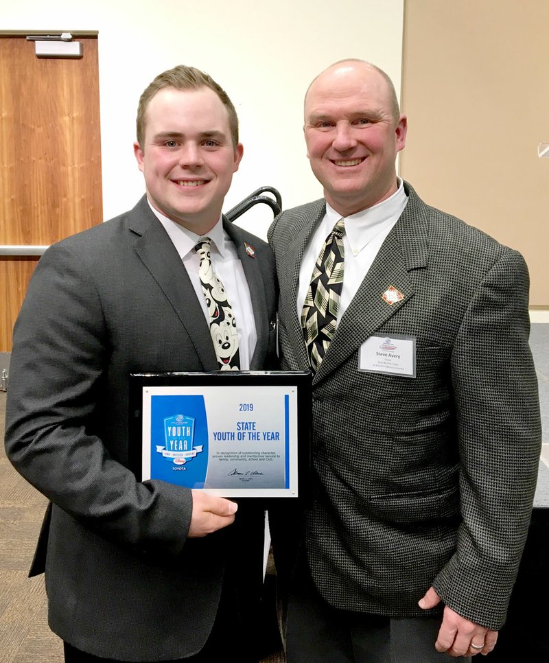 Photo submitted Matt Avery, left, recently won 2019 Arkansas Boys &amp; Girls Club Youth of the Year. He is pictured with his father, Steve Avery, who also volunteered as his Boys &amp; Girls Club football and soccer coach.