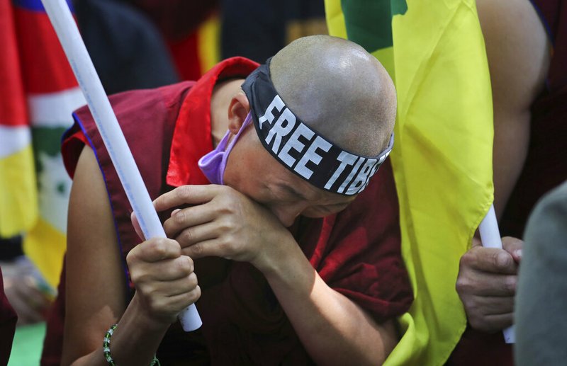 60 years after Dalai Lama fled, China defends Tibet policies