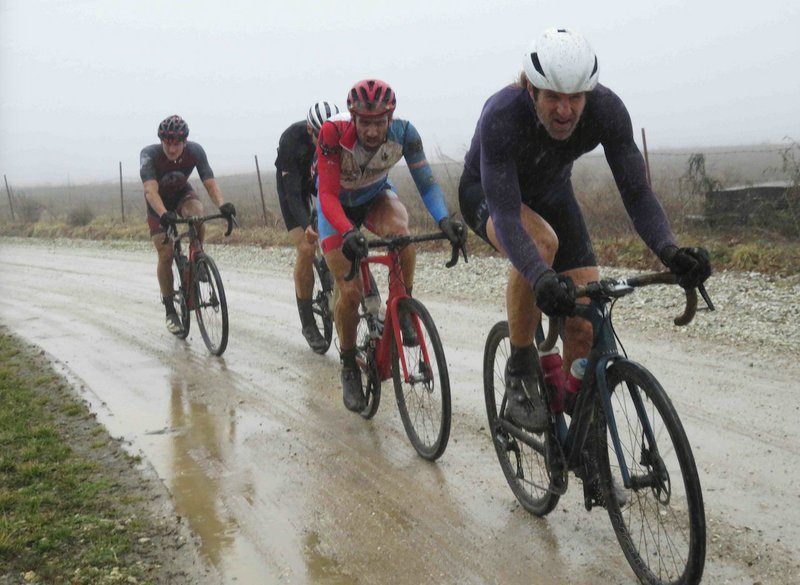 Andy Chasteen of Oklahoma City, Will Stoffel of Bentonville, Sam Pickman of Little Rock and Austin Morris of Fayetteville break from the pack after topping the first climb Feb. 23, during the Hazel Valley Gran Prix in the Ozark Mountains.

(Special to the Democrat-Gazette/NANCY RANEY)