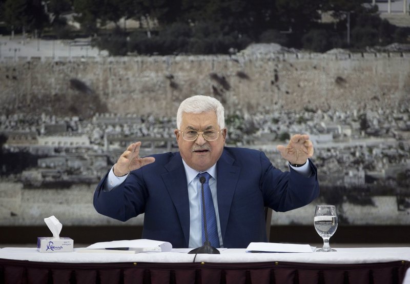 FILE - In this Dec. 22, 2018 file photo, Palestinian President Mahmoud Abbas speaks during a meeting of the Palestinian leadership in the West Bank city of Ramallah. Abbas has chosen longtime adviser Mohammed Ishtayeh as his new prime minister, officials said Sunday, March 10, 2019, a step that further deepens the rift with the rival Hamas group. Ishtayeh, a British-educated economist, is a top official in Abbas' Fatah movement. (AP Photo/Majdi Mohammed, File)