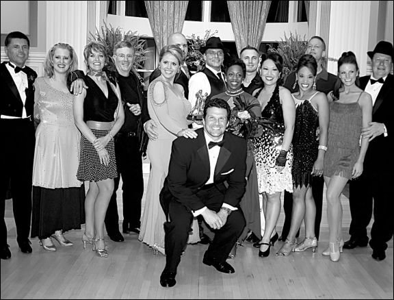 Dancing With The YStars People’s Choice 2008 winner Jennifer Christman (center, trying too hard and totally looking the wrong way) won by a landslide … OK, one vote. Others photographed include (back row, left to right): Wayne Richie, Kelly Brazile, Lisa Sheridan, Pay Hays, Ray Sheridan, Chael Mellard, Tjuana Byrd, Jasen Page, Liz Massey, Karen Smith, Chris Hoffman, Allison Stodola, Mark Stodola and (front row) David Bazzel. Photo courtesy of Lynette Runsick Photography