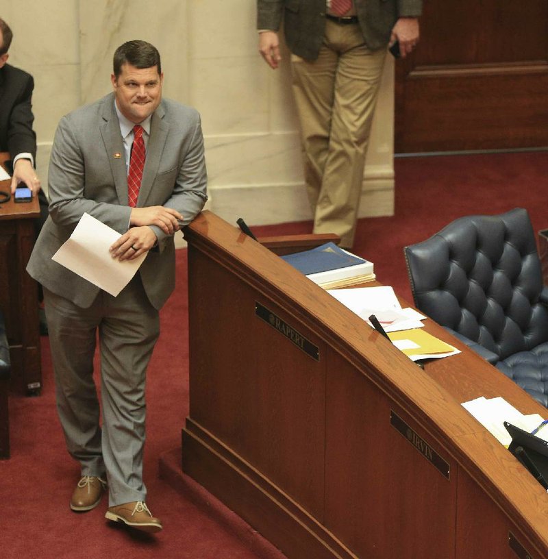 Sen. Bart Hester, R-Cave Springs, waits Monday in the Senate to present a bill that would exempt documents re- lated to execution drugs from Freedom of Information Act requests. More photos are available at arkansasonline. com/312genassembly/