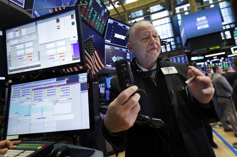 Trader Robert Moran works on the floor of the New York Stock Exchange, Monday, March 11, 2019. Stocks are opening broadly higher on Wall Street, although a sharp drop in Boeing is pushing the Dow Jones Industrial Average lower. (AP Photo/Richard Drew)