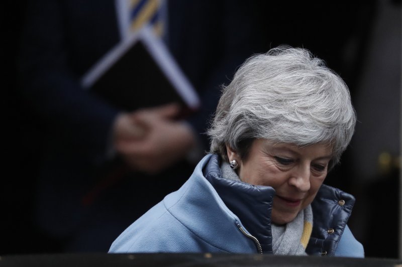 Britain's Prime Minister Theresa May leaves from Downing Street in London, Tuesday, March 12, 2019. Prime Minister Theresa May scrambled to win last-minute changes from the European Union to her Brexit deal Monday, a day before a crucial vote in Britain's Parliament that could derail the country's withdrawal from the EU — and cost May her job. (AP Photo/Frank Augstein)