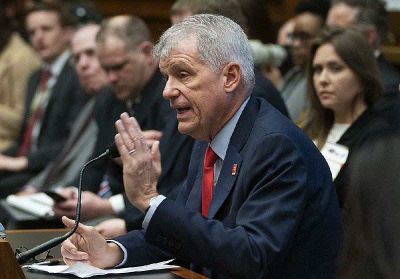 Wells Fargo Chief Executive Officer Timothy Sloan is questioned Tuesday by the House Financial Services Committee about a series of scandals that have engulfed the company and affected millions of customers. 