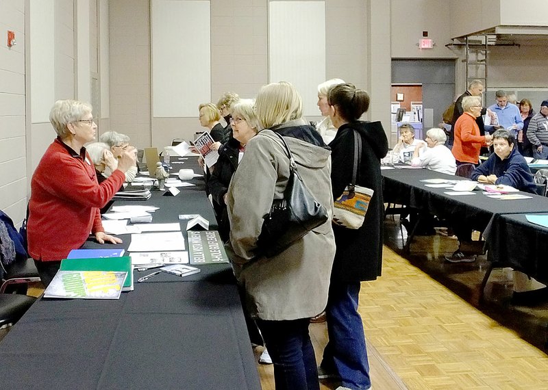 Lynn Atkins/The Weekly Vista The golf groups attend the annual Golf Expo to sign up new members. There are groups for women, for men and for couples that play on every day of the week.
