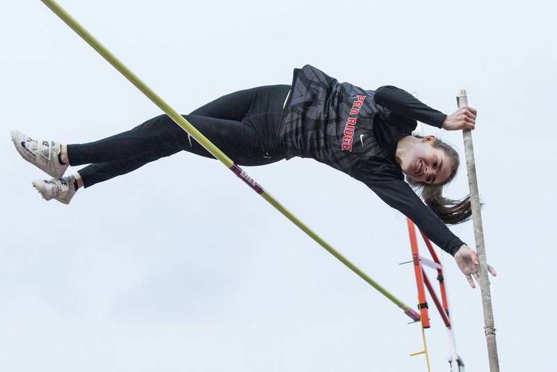 NWA Democrat-Gazette/BEN GOFF @NWABENGOFF
Cassidy Mooneyhan of Pea Ridge clears the bar at 11 feet, 6 inches in the girls pole vault Friday, March 8, 2019, during the Joe Roberts Invitational track meet at Springdale High School. Mooneyhan won with a vault of 12 feet. 