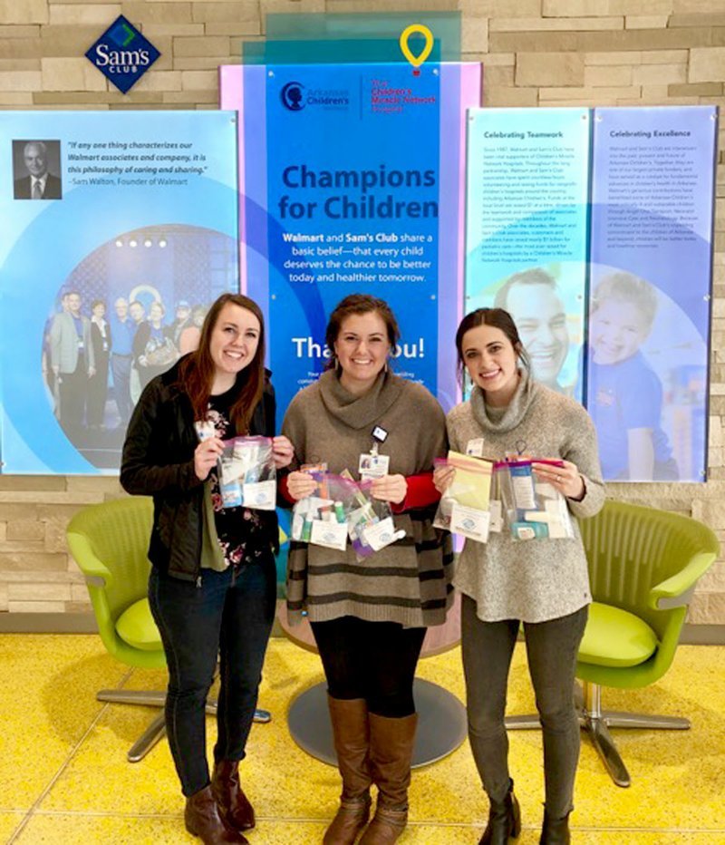 Photo submitted Boys &amp; Girls Club of Western Benton County recently donated items for family packs for families of children who have extended stays at Arkansas Children's Northwest in Springdale. Pictured are Candace Hayes, left, program coordinator for Boys &amp; Girls Club of Western Benton County; Rebecca Neely, volunteer engagement program manager for Arkansas Children's Northwest; and Blythe Wilt, marketing and special events coordinator for Boys &amp; Girls Club of Western Benton County.