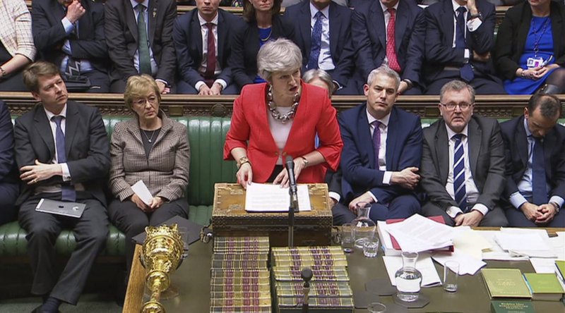 In this image taken from video, Britain's Prime Minister Theresa May speaks to lawmakers in parliament, London, Tuesday March 12, 2019. Britain's Parliament delivered a crushing defeat to Prime Minister Theresa May's European Union divorce deal Tuesday, plunging the Brexit process into chaos just 17 days before the U.K. is due to leave the bloc. (House of Commons/PA via AP)