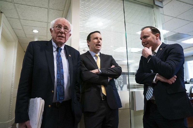 Sens. Bernie Sanders of Vermont (from left), Chris Murphy of Connecticut and Mike Lee of Utah meet Wednesday in Washington before a news conference on the Senate vote on ending U.S. support for the Saudi Arabian-led coalition fighting in Yemen. 