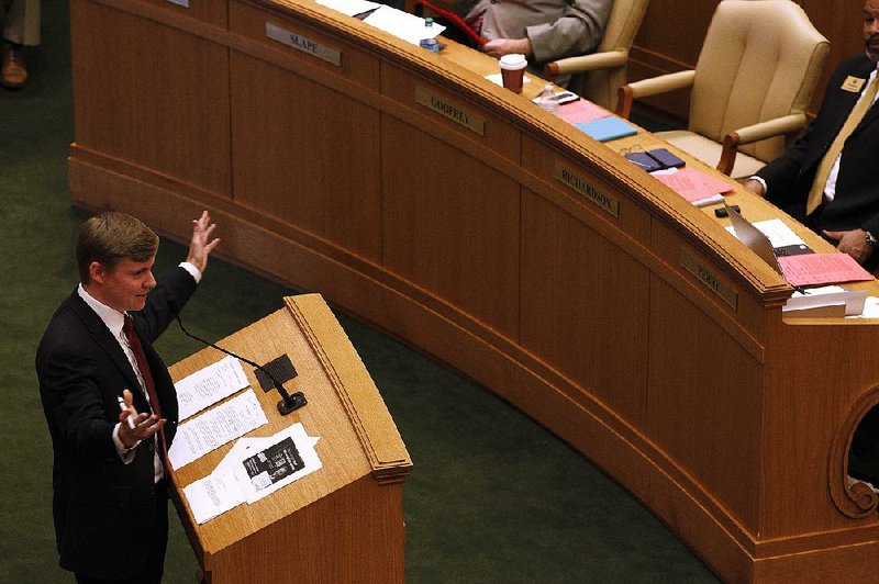 Rep. Jimmy Gazaway talks to fellow House members Wednesday about his legislation to make public the names of people who donate to groups that buy ads concerning appellate court elections. Gazaway pulled down the bill Wednesday after lawmakers voiced concerns about its specific language. More photos at arkansasonline.com/314genassembly/