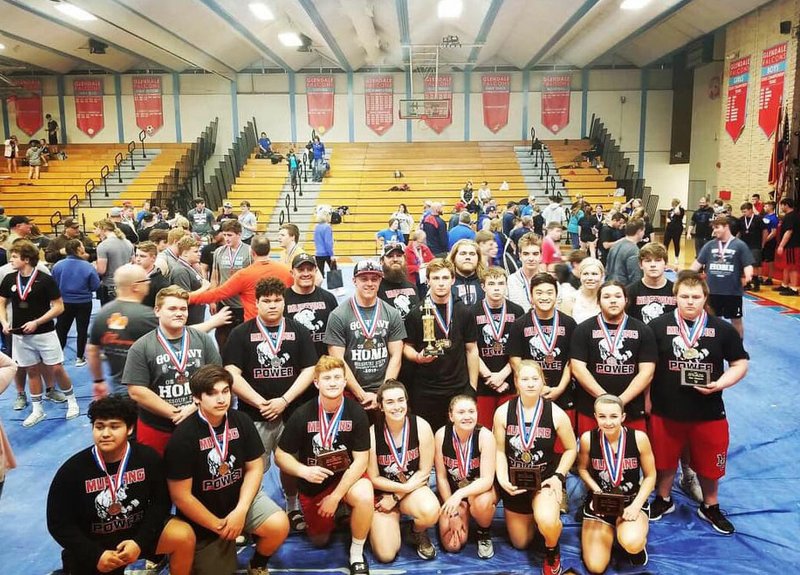 RICK PECK/SPECIAL TO MCDONALD COUNTY PRESS The McDonald County High School boys' powerlifting team took fourth and the girls' team took seventh at the state powerlifting championships held March 9 at Glendale High School in Springfield.