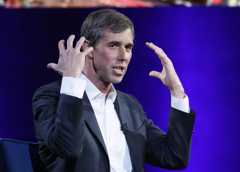 In this Feb. 5, 2019, photo, former Democratic Texas congressman Beto O'Rourke gestures as he describes how nervous he was meeting with former President Barack Obama during an interview with Oprah Winfrey live on a Times Square stage at "SuperSoul Conversations," in New York. (AP Photo/Kathy Willens)

