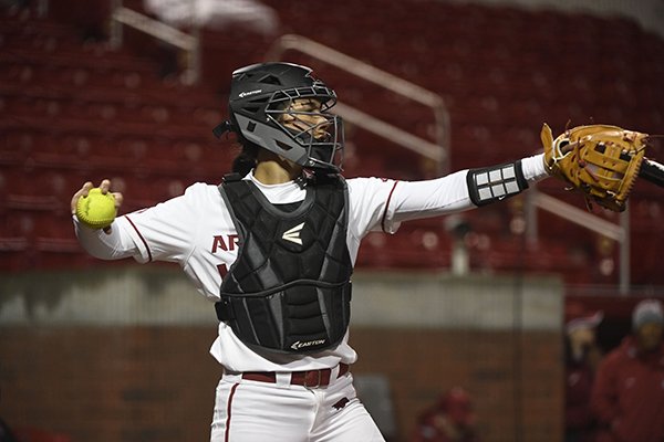 Arkansas catcher Kayla Green makes a throw against SEMO during an NCAA softball game on Friday Feb. 22, 2019 in Fayetteville. (AP Photo/Michael Woods)

