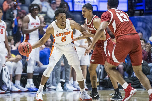 Florida guard KeVaughn Allen looks to pass during an SEC Tournament game against Arkansas on Thursday, March 14, 2019, in Nashville, Tenn. 