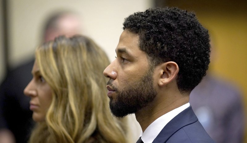 Actor Jussie Smollet, right, stands with his attorney Tina Glandian before Cook County Circuit Court Judge Steven Watkins at the Leighton Criminal Court Building, Thursday, March 14, 2019 in Chicago. 