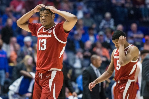 Mason Jones (13) and Jalen Harris, Arkansas guards, react in the second half vs Florida Thursday, March 14, 2019, during the second round game in the SEC Tournament at Bridgestone Arena in Nashville.