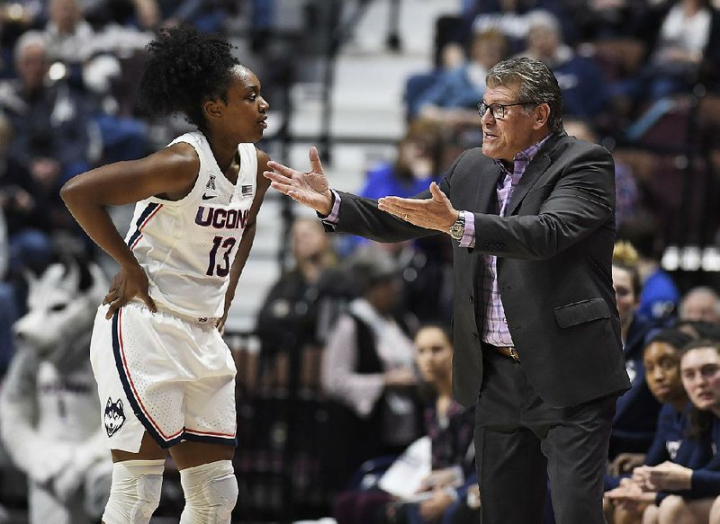 Connecticut guard Christyn Williams (Central Arkansas Christian) gets instructions from Coach Geno Auriemma earlier this week during the Huskies’ 81-45 victory over South Florida in the semifinals of the American Athletic Conference Tournament in Uncasville, Conn. Williams scored 39 points over UConn’s three victories in the tournament, something Auriemma said helped the Huskies overcome the loss of senior Katie Lou Samuelson.